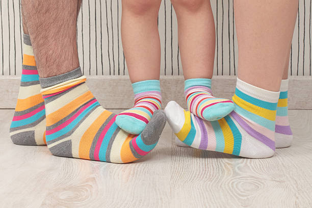 istock family in socks 502910709