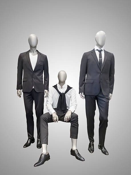 istock Three male mannequins dressed in suit 502911370