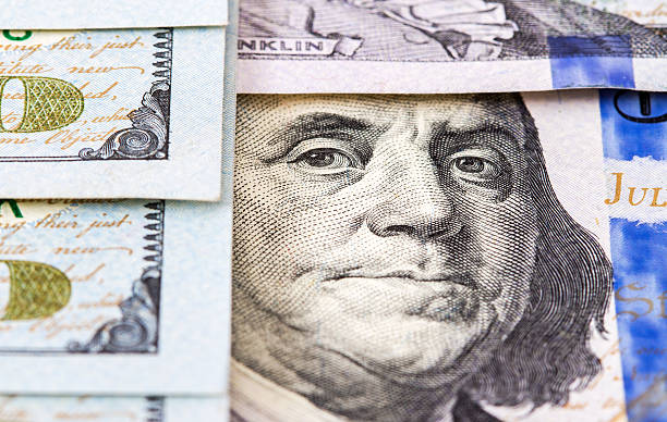 istock Benjamin Franklin portrait from 100 dollars banknote 502913204
