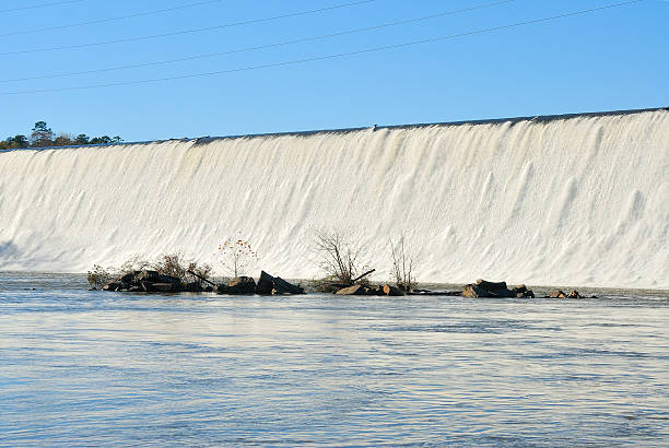 Water flowing over dam after heavy rains