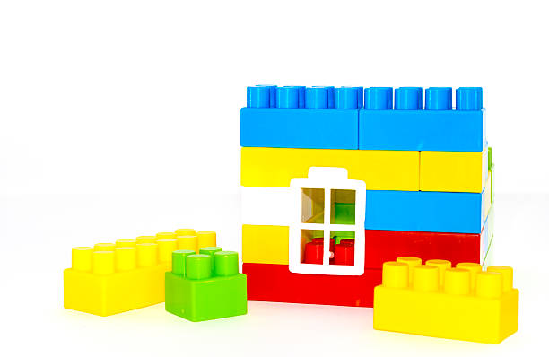istock House building from plastic block bricks on a white background 502914692
