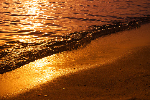 Sun reflection on the sea surface at sunset