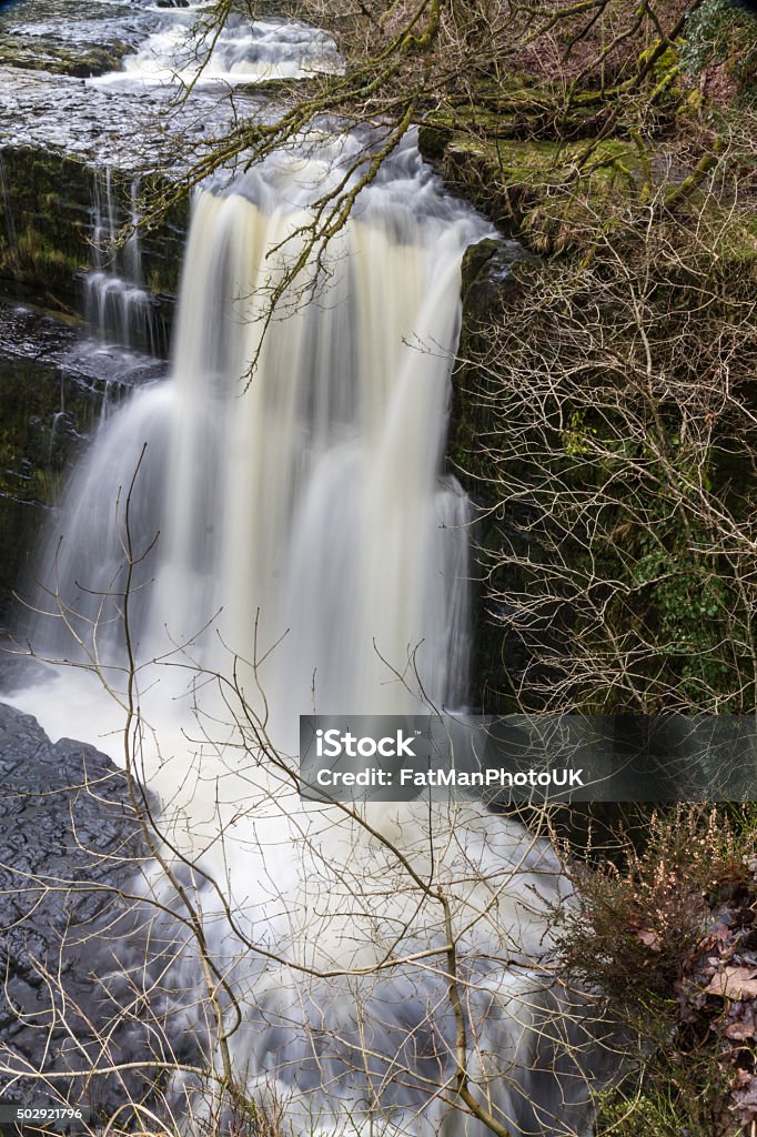 Sgwd Clun-Gwyn waterfall. On the river Afon Mellte South Wales, Sgwd Clun-Gwyn Falls, waterfall. Pontneddfechan, Vale of Neath, Powys, Wales, United Kingdom, winter. 2015 Stock Photo