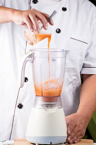 istock pouring Thai Tea to Blender 502923560