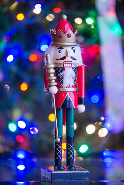 istock Soldier nutcracker statue standing in front of decorated Christm 502934264