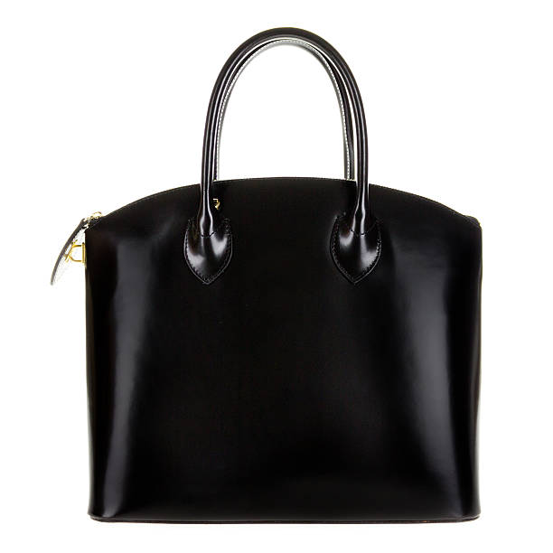 istock Black leather women's tote handbag on white background 502935014