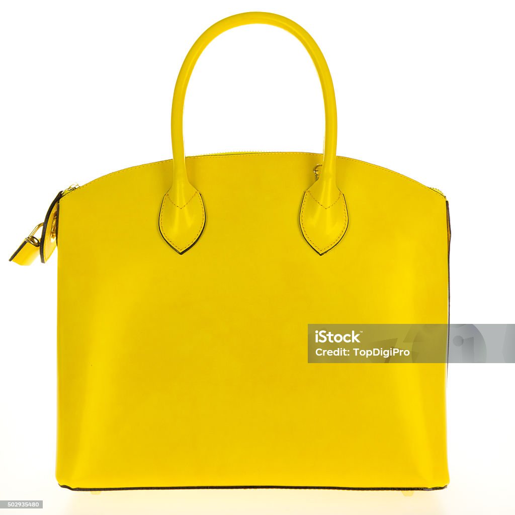 Gelbes Leder-Tragetasche für Frauen Handtasche auf weißem Hintergrund - Lizenzfrei Handtasche Stock-Foto