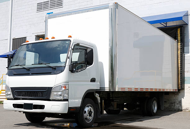 istock White truck at dock. 502936028