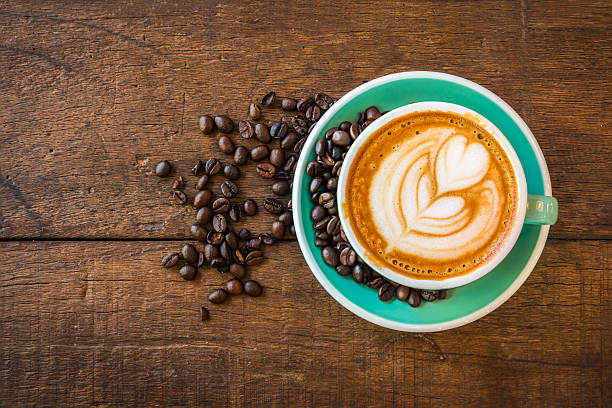 istock Latte hot coffee and roasted coffee beans. 502936270