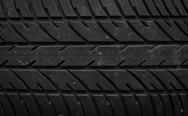 car tires old pile of a worn out car tires pattern background car wheel stock pictures, royalty-free photos & images