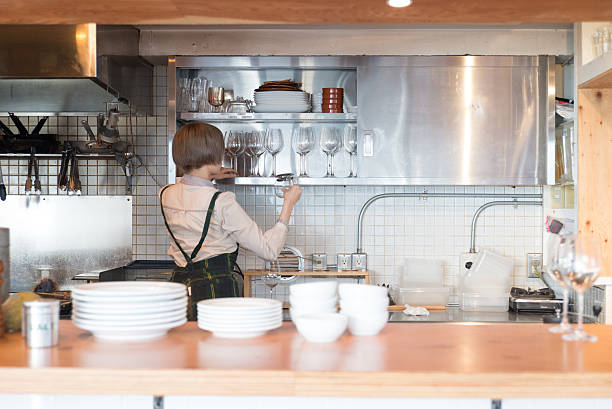 istock Young japanese lady woking at kitchen 502936944