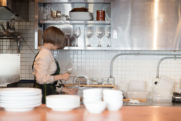 istock Young japanese lady woking at kitchen 502936996