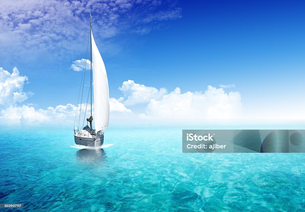 Travel Sailing boat in the ocean Blue Stock Photo