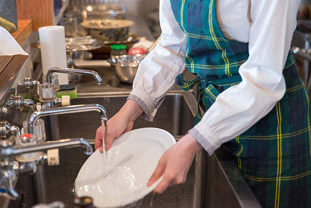 Young japanese lady woking at kitchen