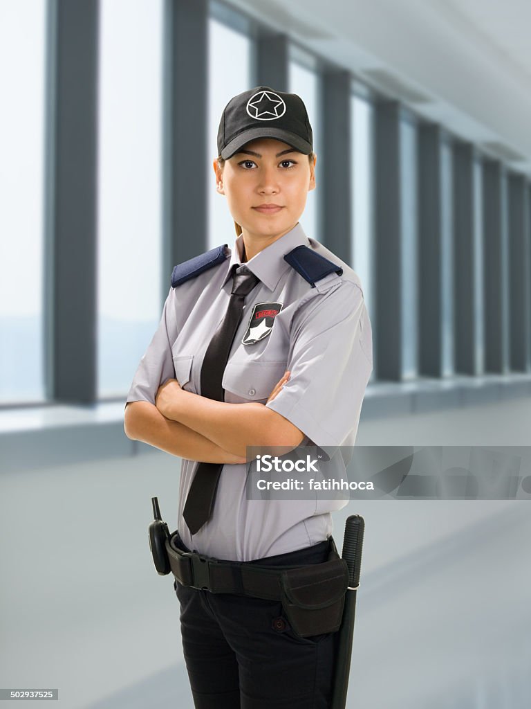 Mujer agente de seguridad - Foto de stock de Guardia de seguridad libre de derechos