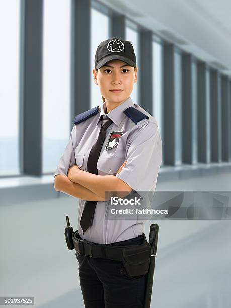Mujer Agente De Seguridad Foto de stock y más banco de imágenes de Guardia de seguridad - Guardia de seguridad, Fémina, Cuerpo de policía