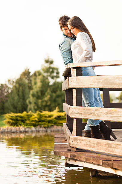 istock Romantic couple by the lake 502937555