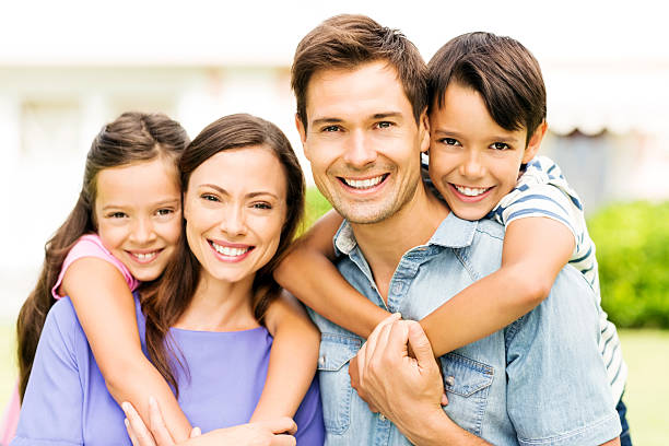 istock Affectionate Young Family Giving Piggyback Ride 502938599