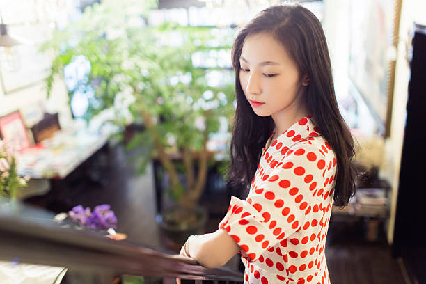 istock girl standing in the attic 502941522