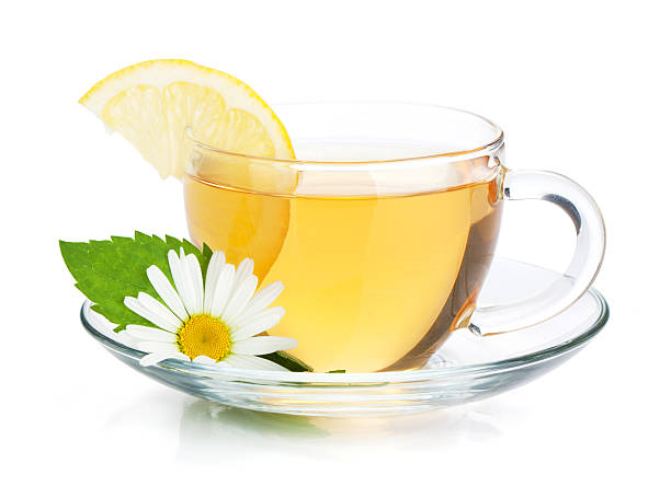 taza de té con limón porción, hojas de menta y de manzanilla - tea cup cup china saucer fotografías e imágenes de stock
