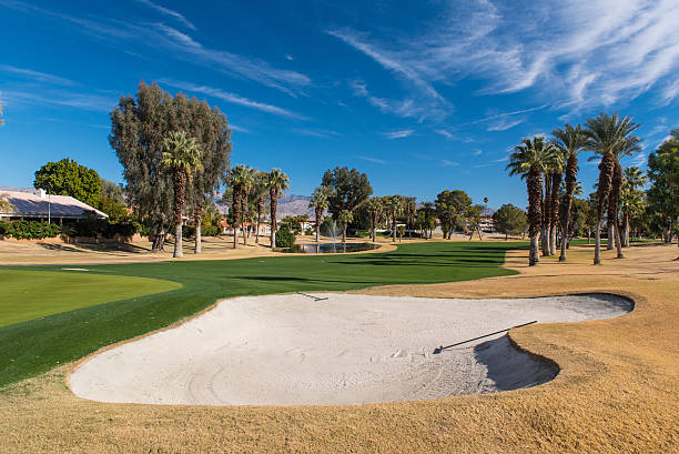 istock Sand trap or bunker near a golf green 502945942