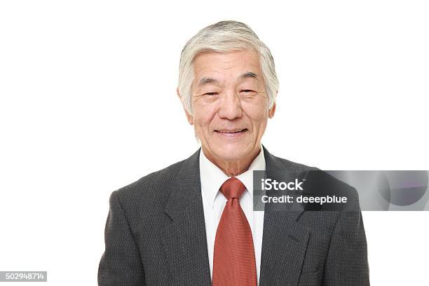 Senior Japanese Businessman Smiles Stock Photo - Download Image Now - 2015, Active Seniors, Adult