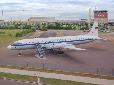 Leipzig, Germany - June 14, 2014: The Ilyushin IL-18 Coot is a large turboprop Soviet airliner aircraft from 1957 now in display in front of Flughafen Leipzig Hall airport