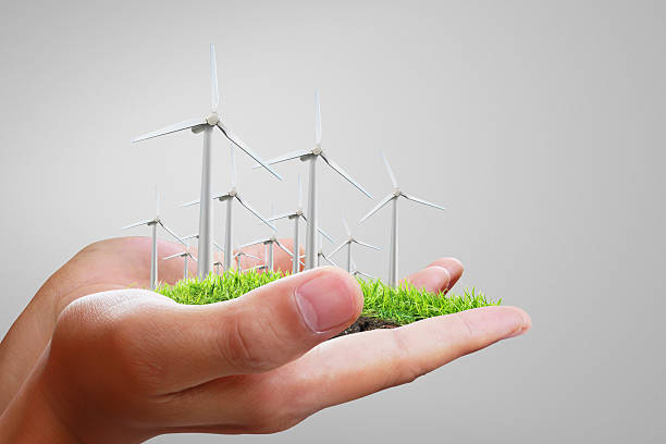 istock Wind turbine in hand 502952417