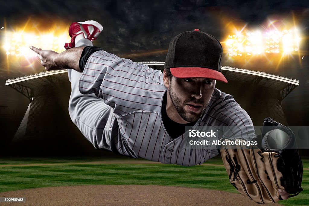 Baseball Player Baseball Player on a baseball Stadium. Baseball - Ball Stock Photo