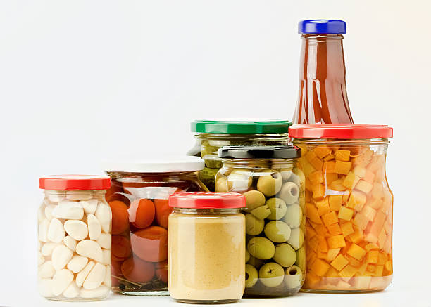 istock five jars of preserved green peas isolated on white 502956487