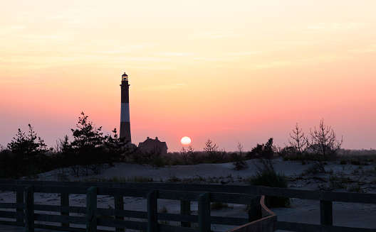 Sunrise at Fire Island. Fire Island lighthouse,dunes and boardwalk. Long Island New Youk.