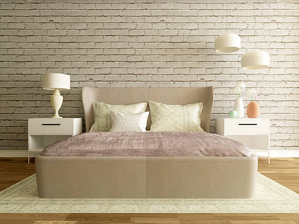 modern bedroom with brick wall stock photo