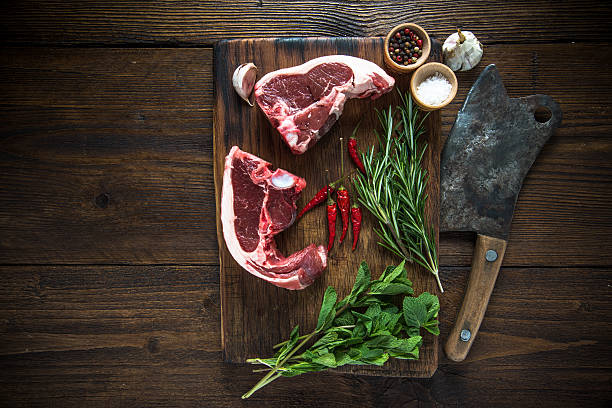 istock Lamb chops with seasoning on cutting board 502966014