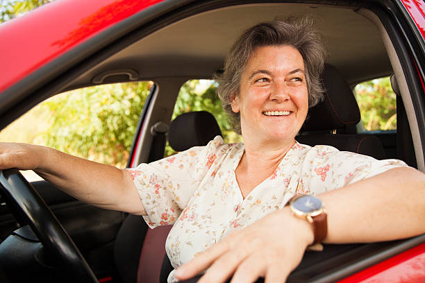 istock senior woman driving car 502968898