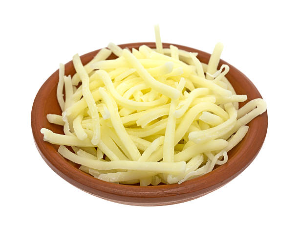 istock Portion of natural white mild cheddar cheese in bowl 502969014