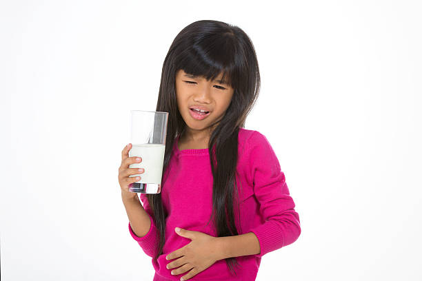 istock young girl has a bellyache 502970880