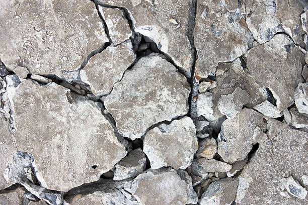 istock Grunge concrete cement wall with crack in industrial building 502970927