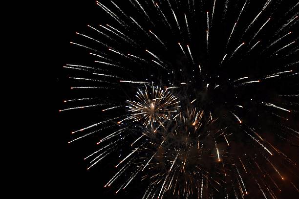 istock Brightly colorful fireworks in the night sky 502971088