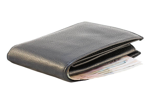 istock purse with money isolated 502972139