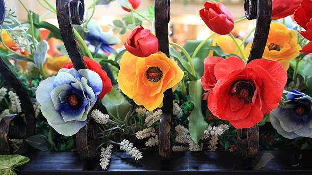 istock Beautiful colors of plastic flowers 502972429