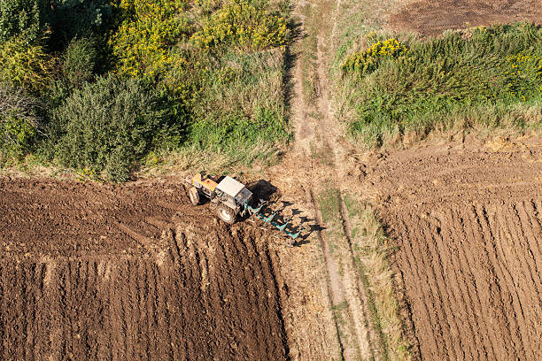 istock aerial view of harvest fields with tractor 502974272