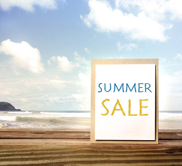 istock Summer sale sign over ocean and sky 502974593