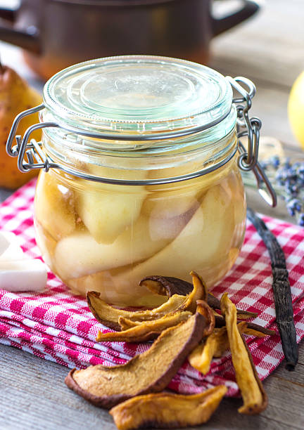 istock Preserved fruit.Homemade pears compote 502975098