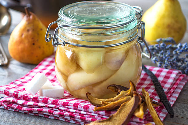 istock Preserved fruit.Homemade pears compote 502975150