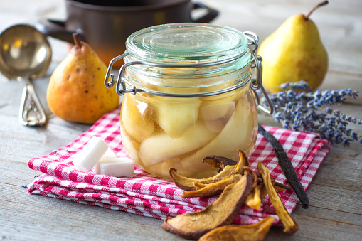 Preserved fruit.Homemade pears compote
