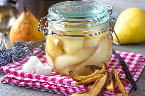 istock Preserved fruit.Homemade pears compote 502975278
