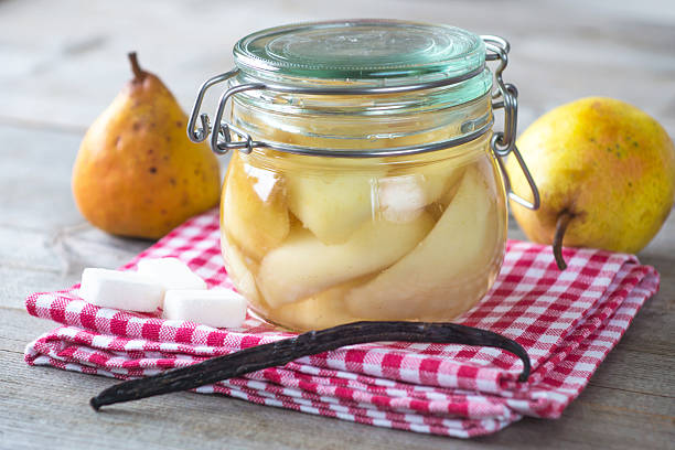 istock Preserved fruit.Homemade pears compote 502975392