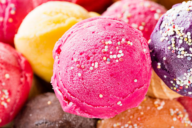 istock Ice cream scoops on wooden table. 502977043
