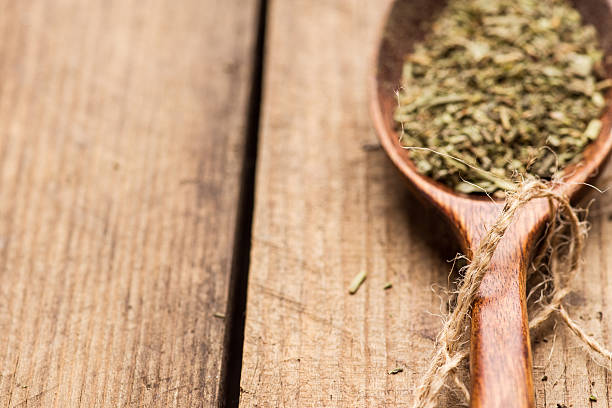 istock Dried thyme on the wooden table 502978290