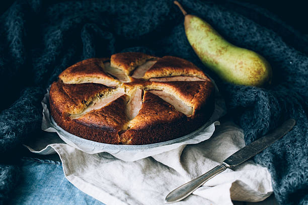 istock sweet biscuit cake with yellow pears 502990002